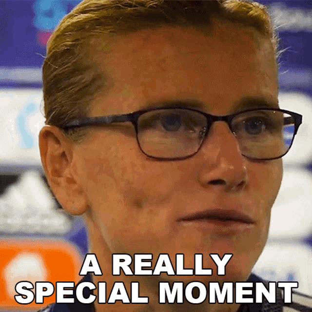 a woman wearing glasses has the words a really special moment above her face