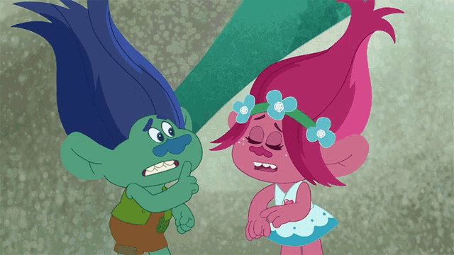 two trolls are standing next to each other and one has a flower crown on her head