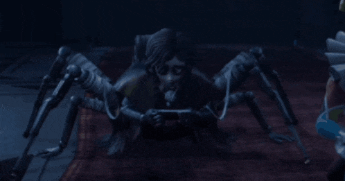 a spider is holding a video game controller and a girl is behind it