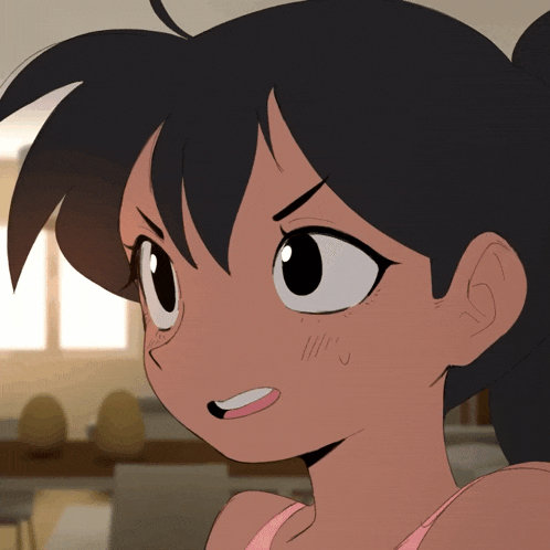 a close up of a girl 's face with a slight smile on her face