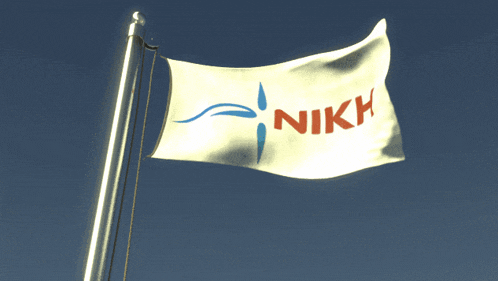 a nikh flag is flying in the wind