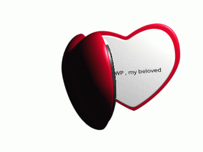 a heart shaped mirror with autoawp my beloved written on it