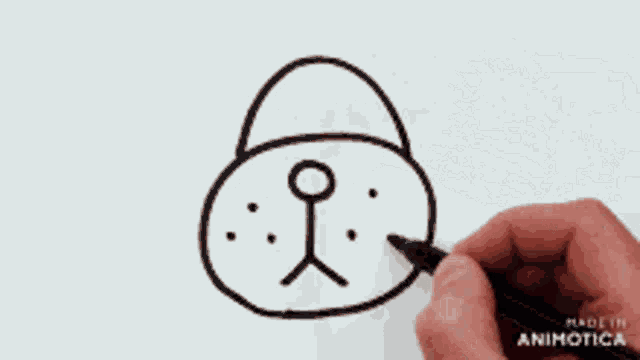 a person is drawing a bear with a black marker and the words made in animatica are visible