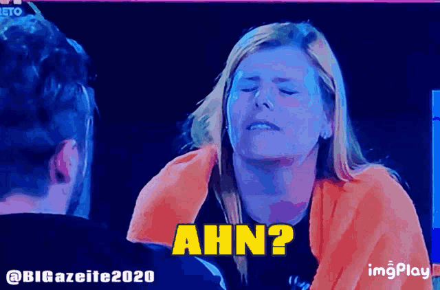 a woman with her eyes closed says ahn on a screen