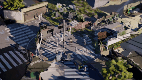 an aerial view of a city intersection with a sign that says ' yield ' on it