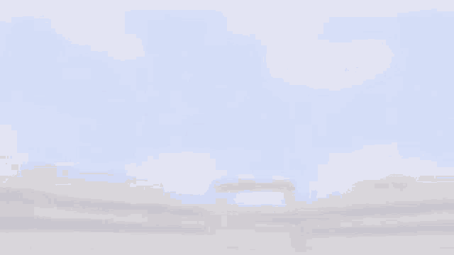 a blurry picture of two cartoon characters looking at each other