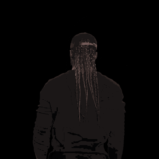 a man with dreadlocks is making a funny face and the word damnnn is behind him