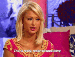 a woman sitting on a couch says this is really really disappointing