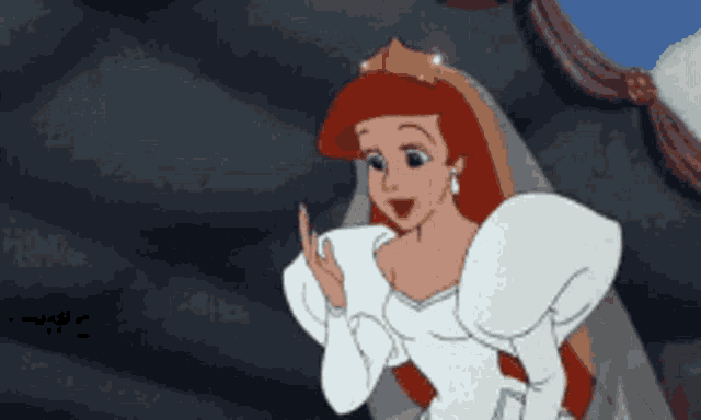 ariel from the little mermaid is wearing a white wedding dress and tiara