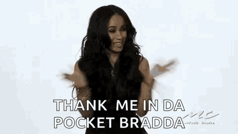 a woman in a black dress is dancing and saying `` thank me in da pocket bradda '' .