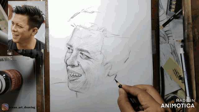 a drawing of a man 's face is being made by made in animatica