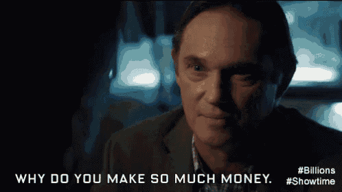 a man in a suit is talking about why do you make so much money