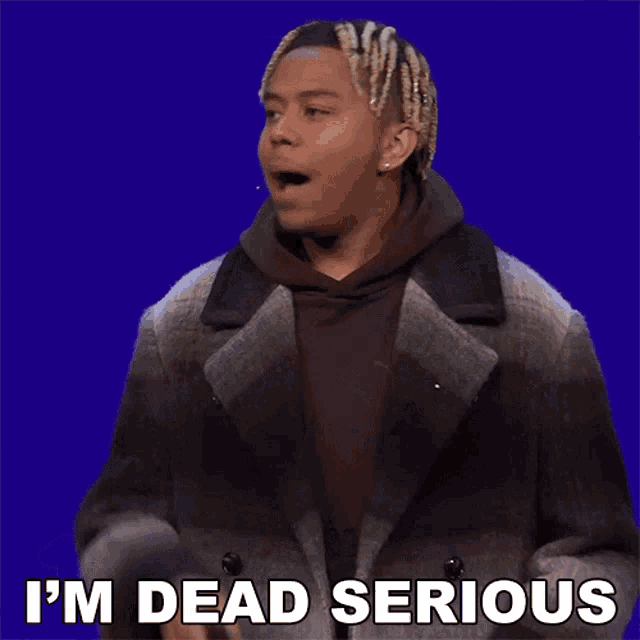 a man in a grey coat says i 'm dead serious