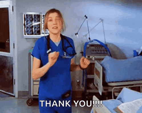 a nurse is dancing in a hospital room and saying thank you .