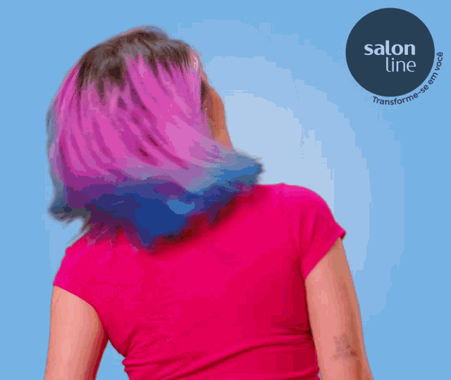 a woman in a pink shirt is standing in front of a blue background with a salon line logo