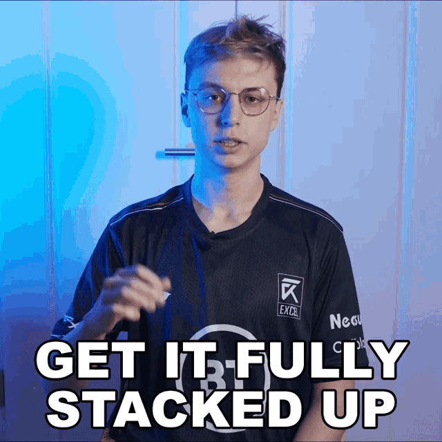 a young man wearing glasses and a shirt that says get it fully stacked up