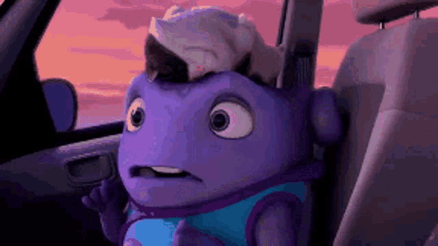 a cartoon character is sitting in the back seat of a car