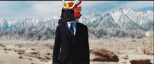 a man in a suit with a gas mask on his head