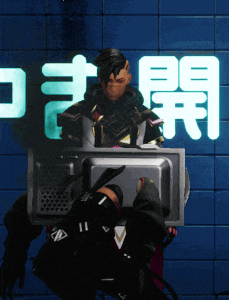 a man is sitting in front of a tv screen with chinese characters behind him
