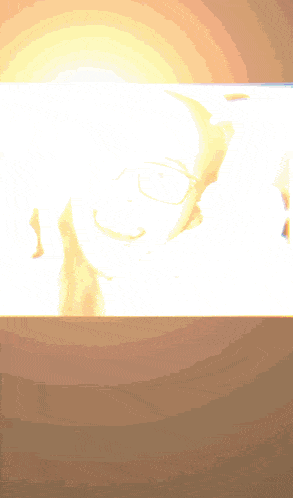 a close up of a woman wearing glasses smiling