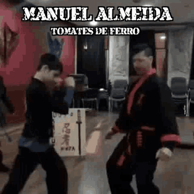 two men are fighting in a room with the words manuel almeida tomatoes de ferro on the bottom .