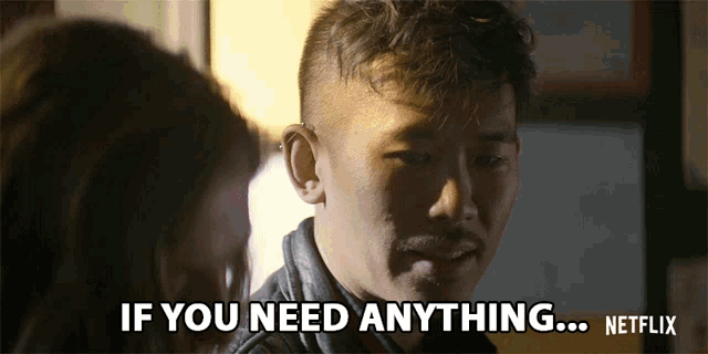 a man is talking to a woman and says if you need anything ... netflix