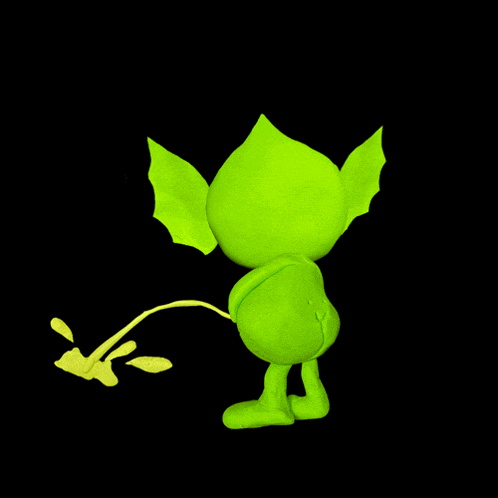 a green cartoon character is urinating on a black surface