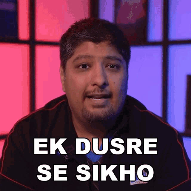 a man says ek dusre se sikho in front of a red and blue background