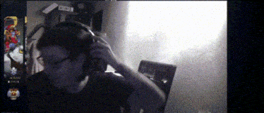 a black and white photo of a man wearing headphones with the year 2001 on the bottom