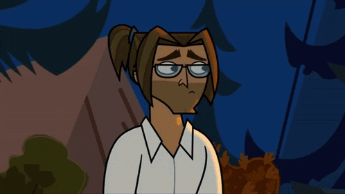 a man with glasses and a ponytail looks sad