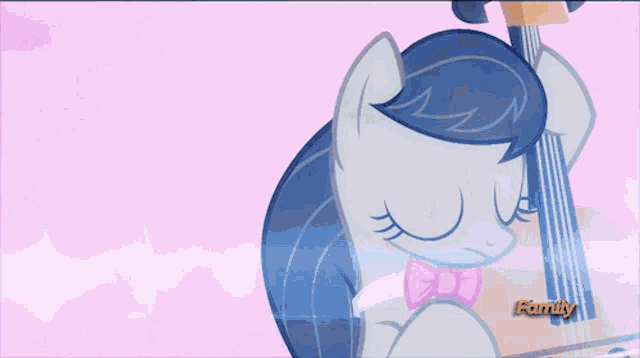 a cartoon of a pony playing a guitar with the word family in the bottom right