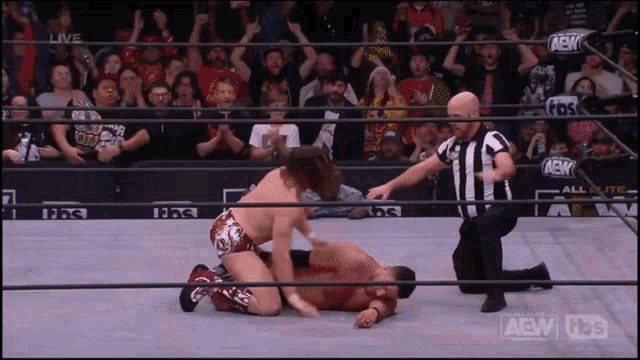a wrestling match is being broadcast live on aem