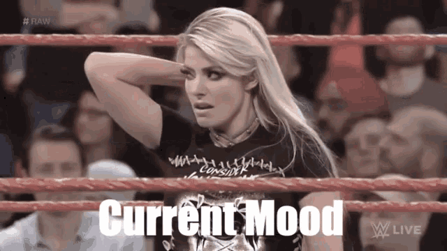 a woman in a wrestling ring with the words current mood written below her