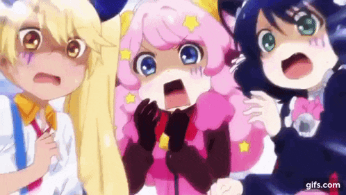 three anime girls are standing next to each other with their mouths open and looking surprised .