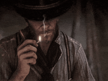 a man in a cowboy hat is smoking a cigarette