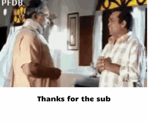 two men are talking to each other in a room with the words `` thanks for the sub '' written below them .