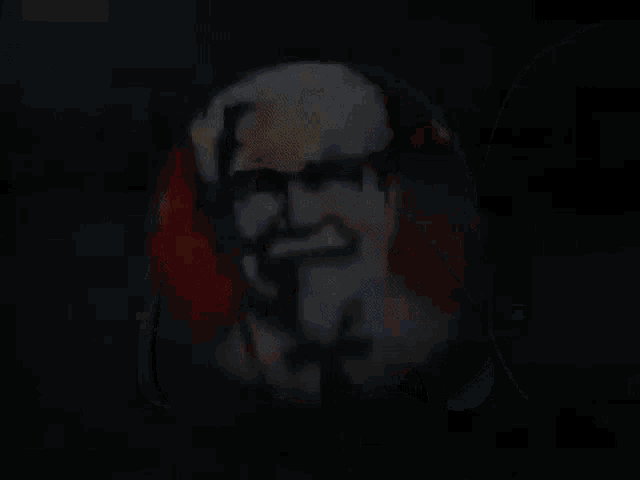 a close up of a kfc logo in a red circle