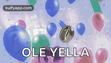 a bunch of balloons are floating in the air with the words ole yella