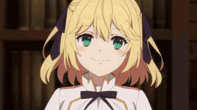 a girl with blonde hair and green eyes has a bow on her head