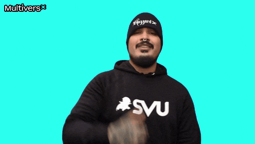 a man giving a thumbs up in front of a blue background that says multiverse