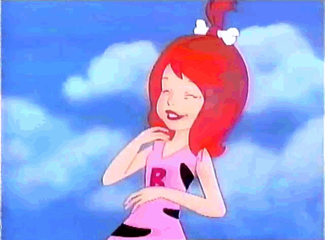 a cartoon character with red hair and a shirt that says r