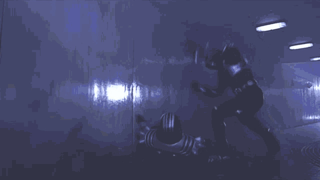a person in a superhero costume is laying on the ground