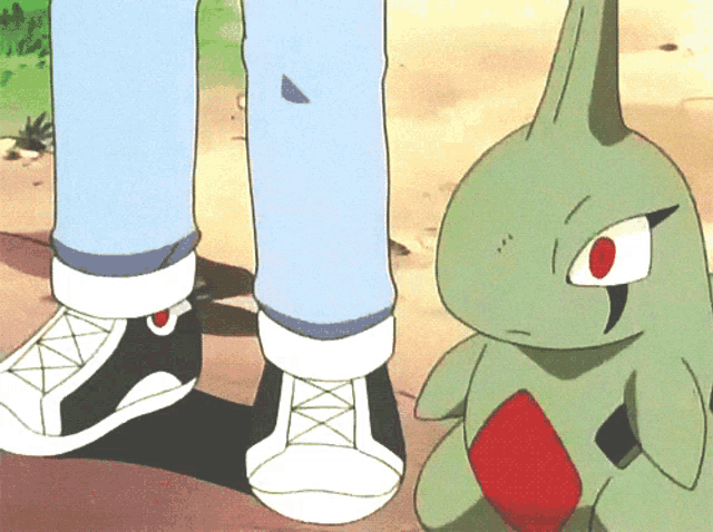 a cartoon of a person standing next to a green monster