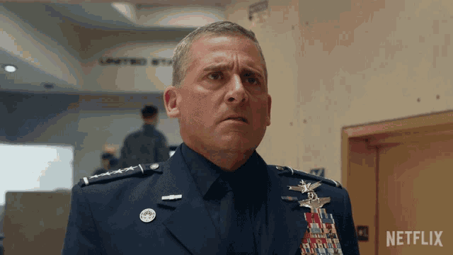 a man in a military uniform is standing in front of a netflix logo