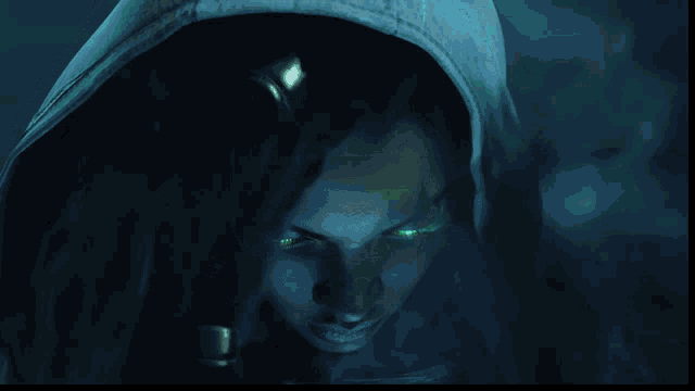 a close up of a person with glowing green eyes