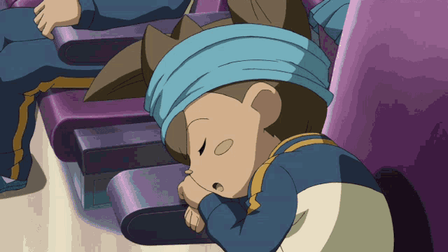 a cartoon character with a blue headband is sleeping on a purple chair