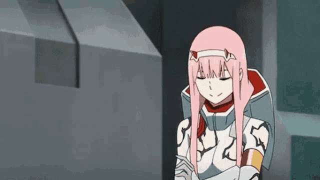 zero two from darling in the franxx is a pink haired anime girl with long hair .