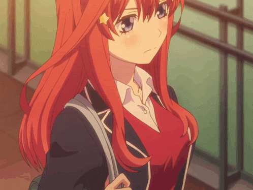 a girl with red hair is wearing a black jacket