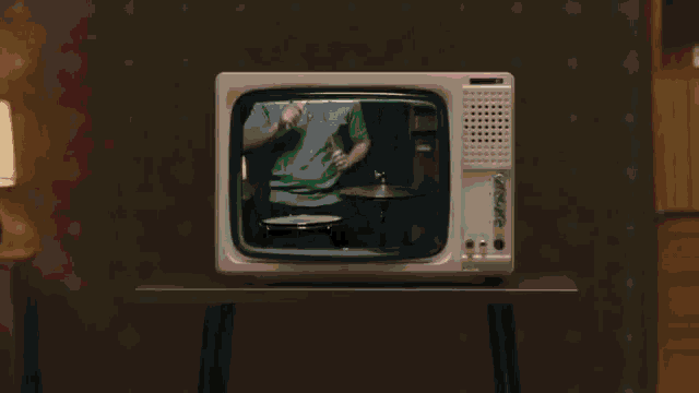 Television Playing Instruments GIF - Television Playing Instruments Music GIFs