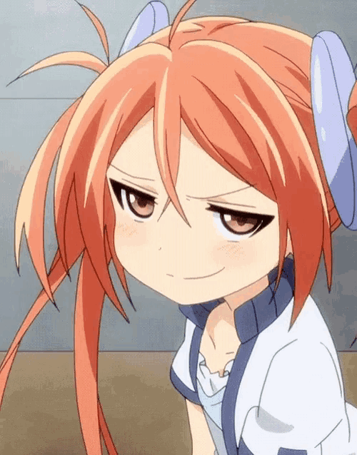 a close up of a girl with orange hair